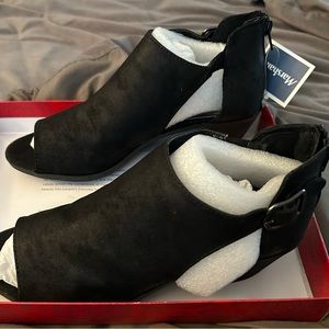 Brand new black open toe ankle boots.